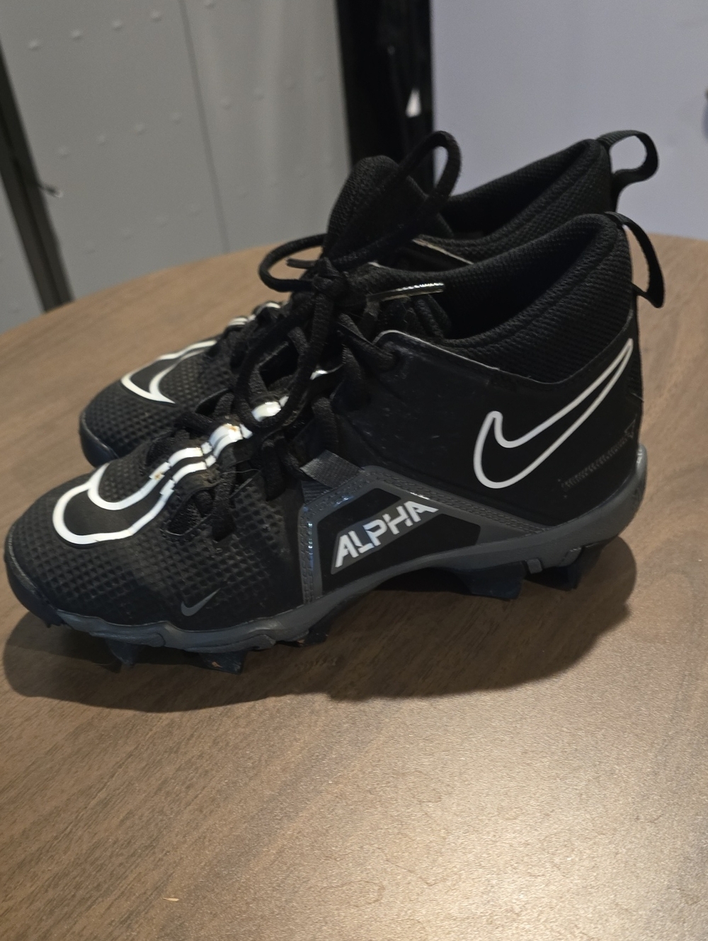 Nike Kids Black and White Alpha Cleat Sneakers
